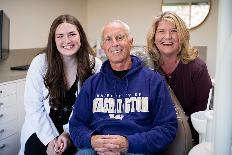 Photo of the doctors and a patient.